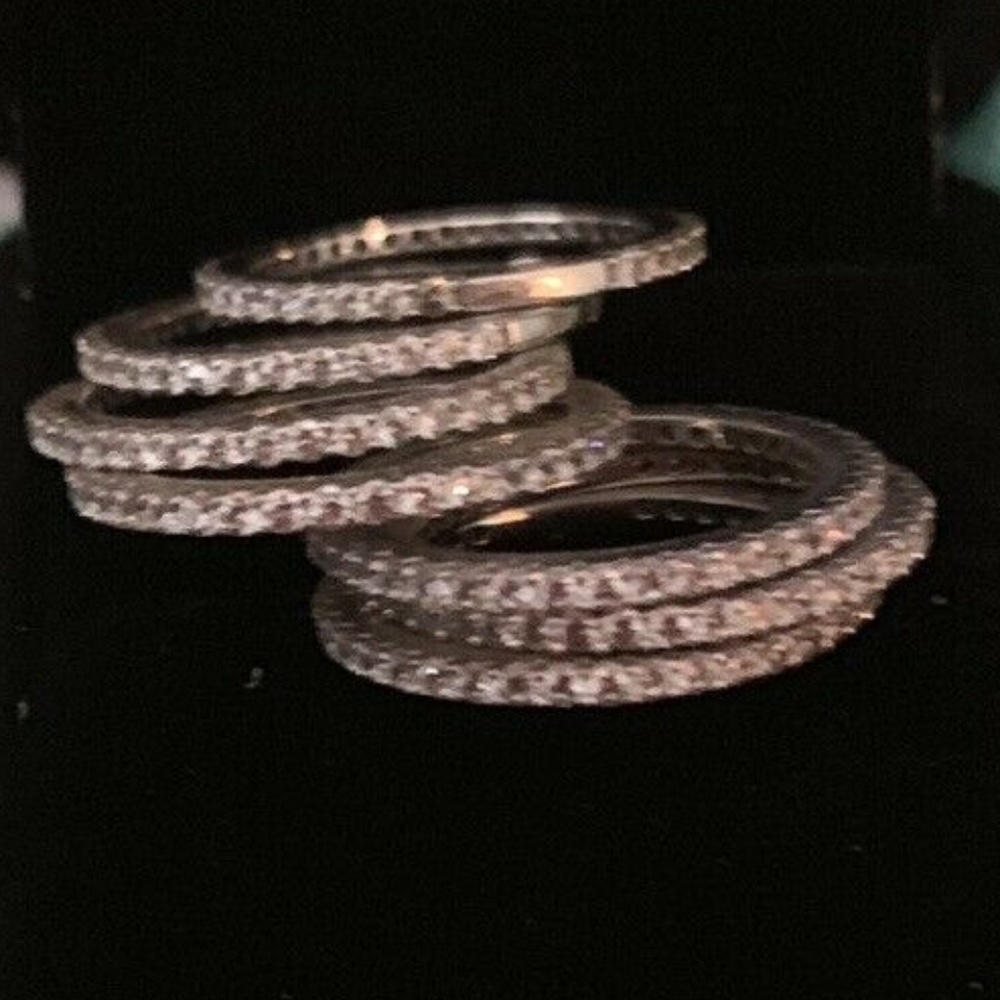 Sterling silver 8-ring set. Size 7